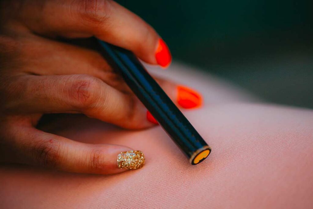 Hand holding a Cannabis Vape Pen
